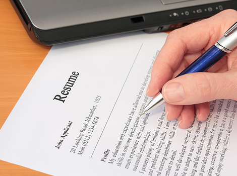 Job Seekers - photo of resume being filled out.